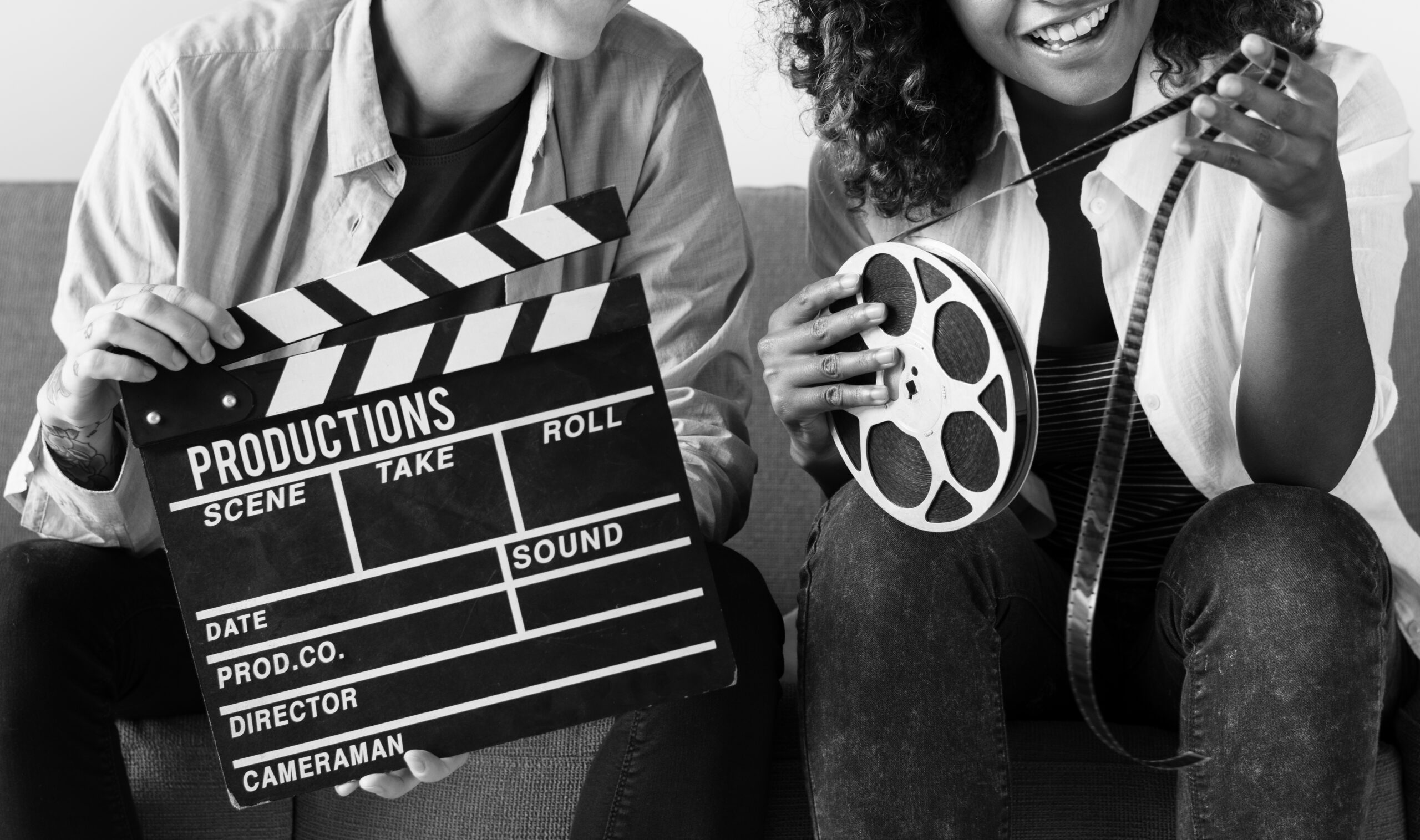 Young Women With Movie Film Reel Scaled